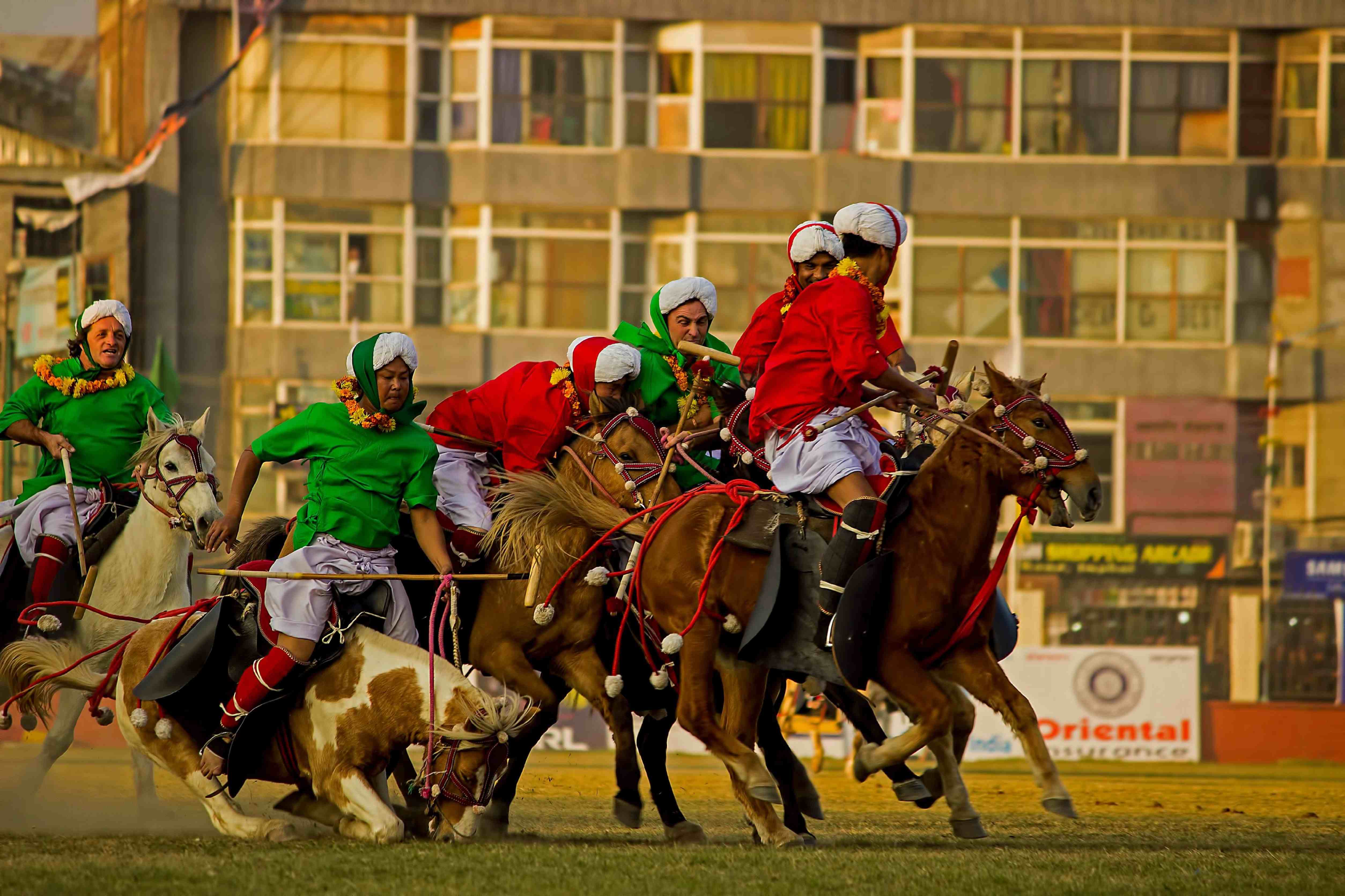 Polo players riding Manipuri ponies